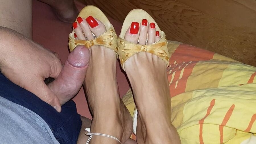 Mules and red toenails