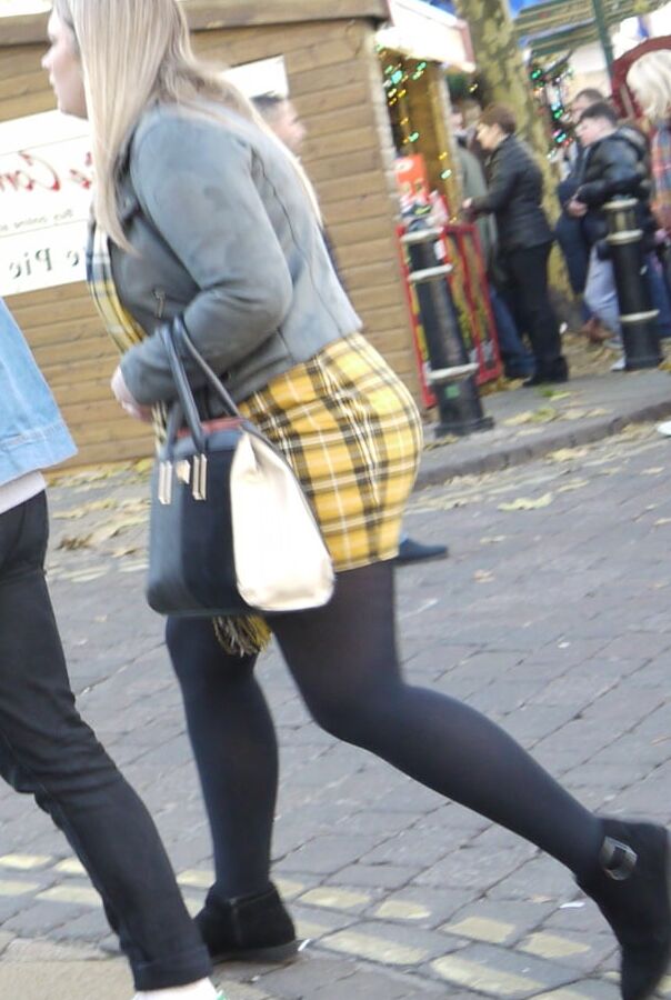 cute blonde in yeloow skirt and black pantyhose