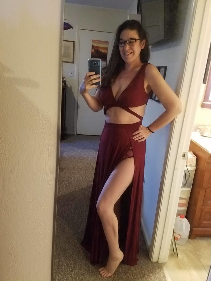 Brunette with glasses shows