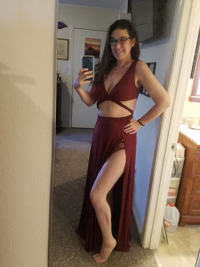 Brunette with glasses shows