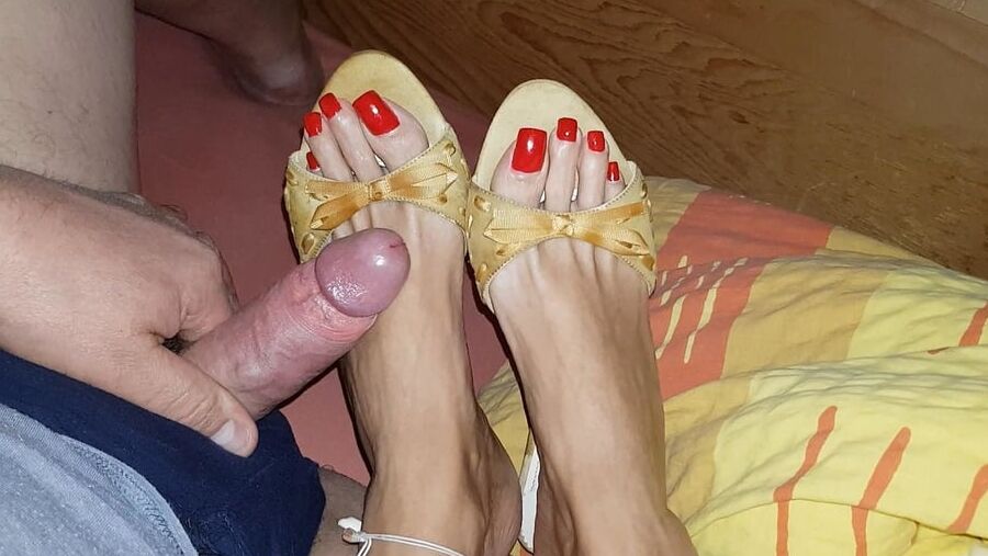 Mules and red toenails
