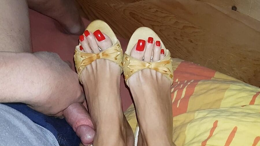 Mules and red toenails