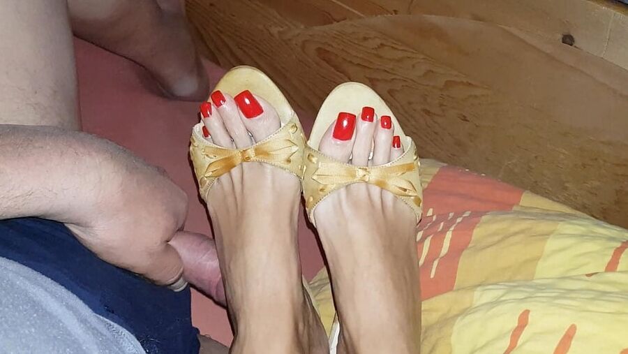 Mules and red toenails