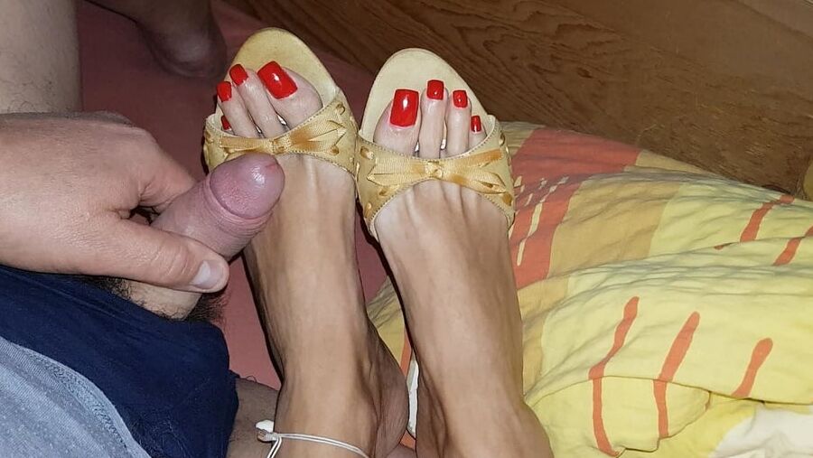 Mules and red toenails