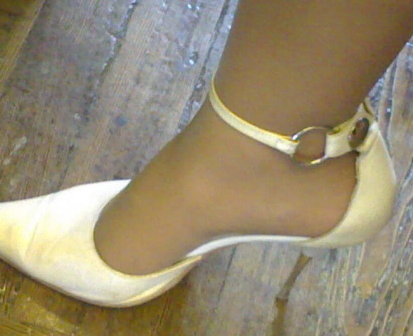 Legs, heels and pantyhose of one of my good friend