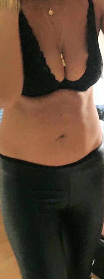wife in black leather leggins