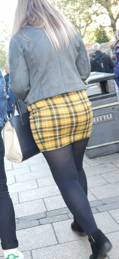 cute blonde in yeloow skirt and black pantyhose