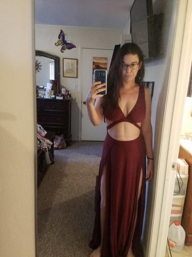 Brunette with glasses shows