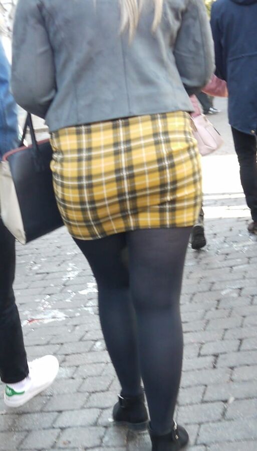 cute blonde in yeloow skirt and black pantyhose