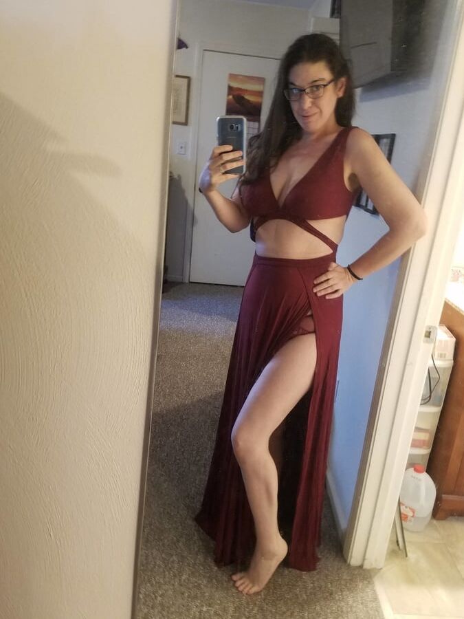 Brunette with glasses shows