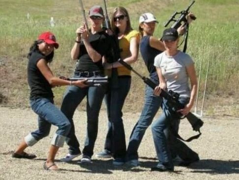 Women in Jeans with guns