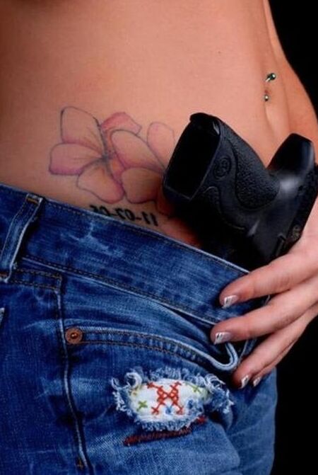 Women in Jeans with guns