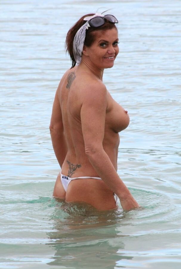 Daniella Westbrook topless Tenerife beach jan