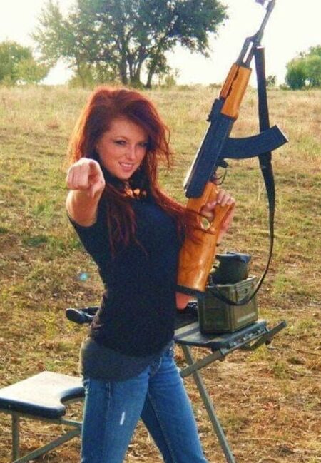 Women in Jeans with guns
