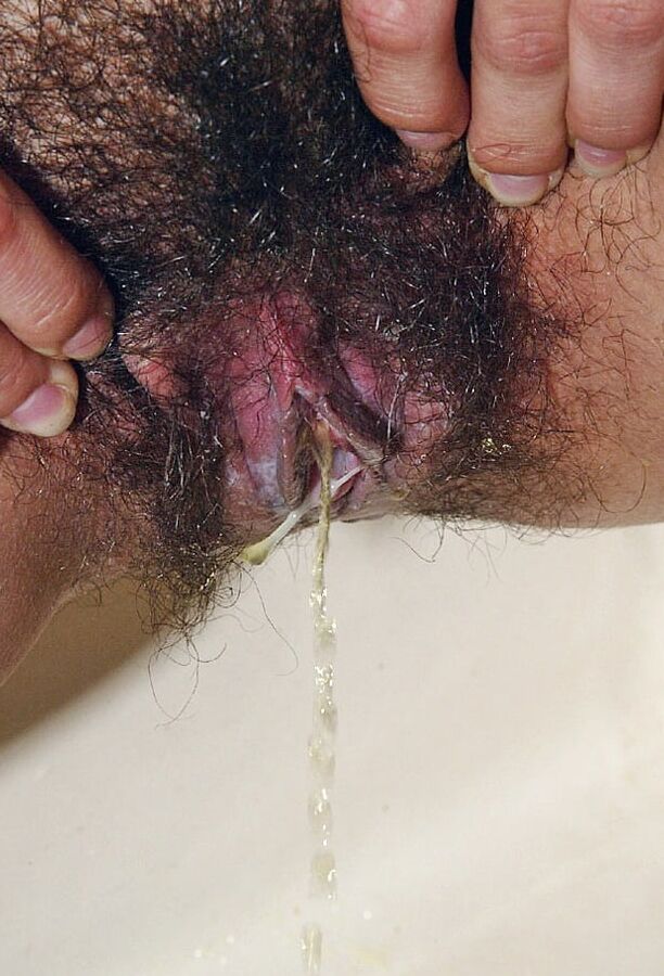 Pissing Over Her Stringy Pussy Discharge