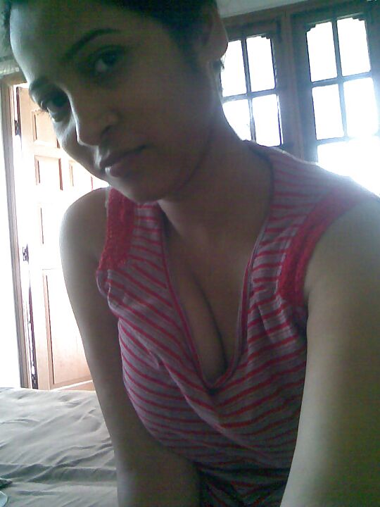 Busty girl shows lovely boobs and pussy