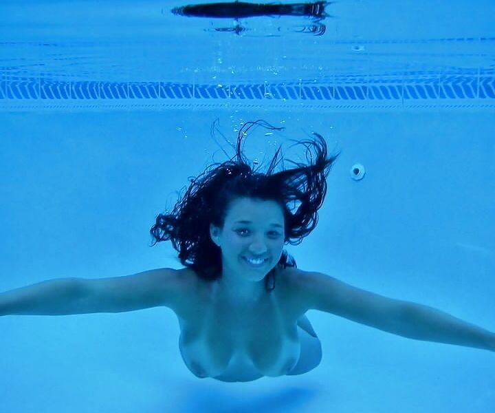 Enjoying her underwater tits