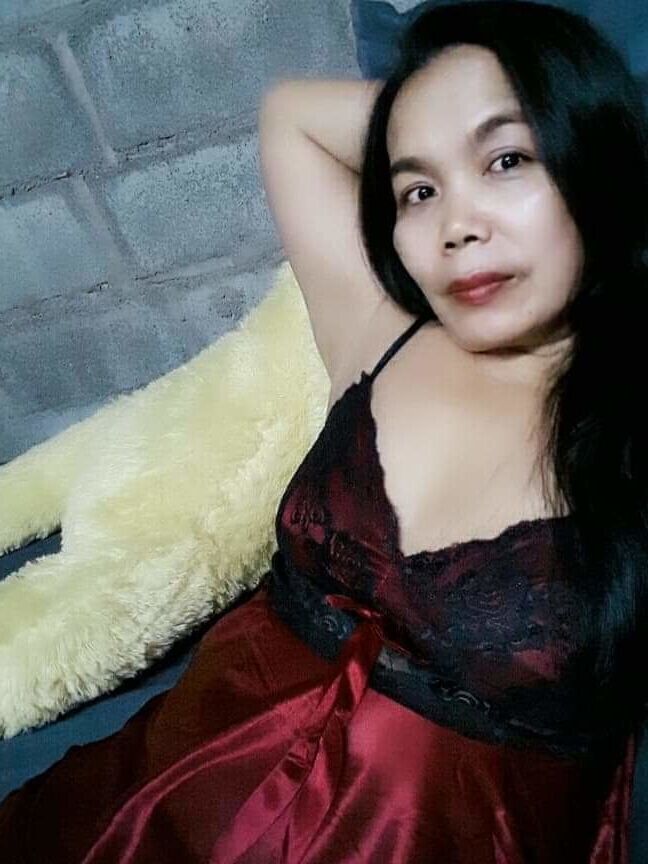 Ibu memakai baju tidur sexy