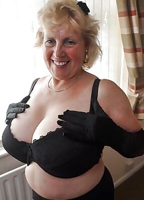 Tahnee in business suit and pink bra