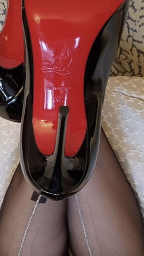 My new silver seamed stockings and black leather skirt