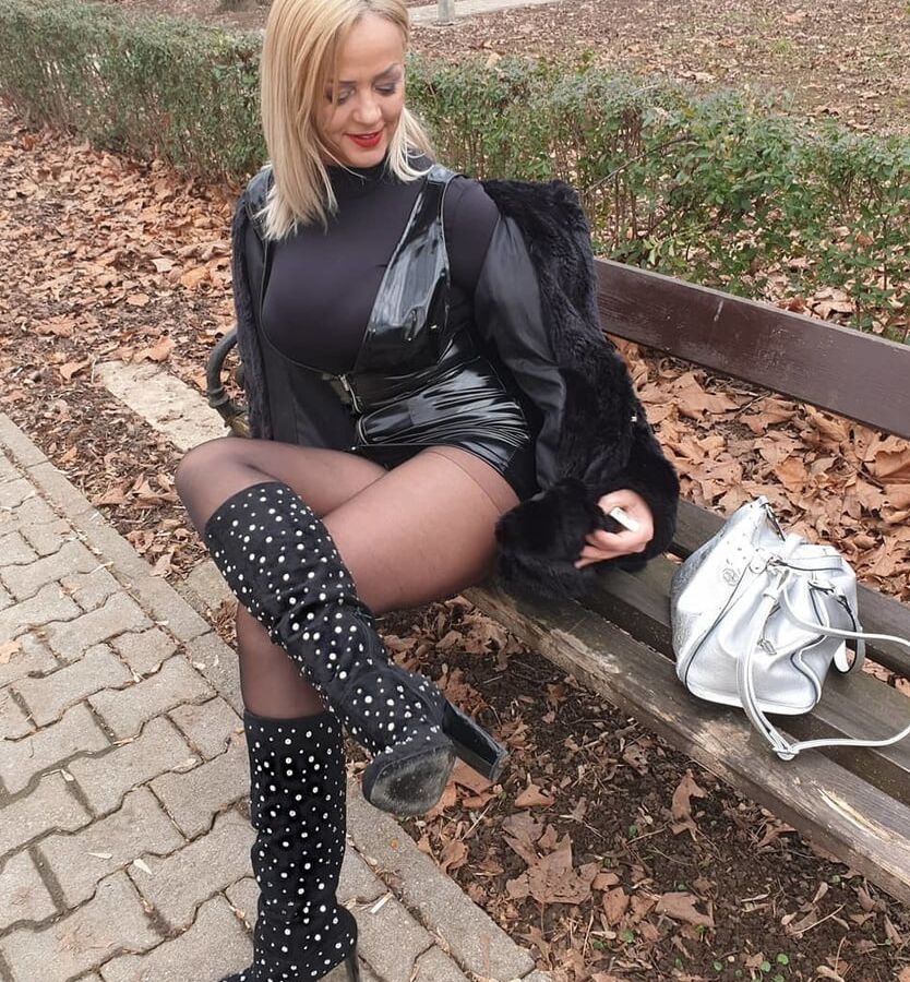 Amateur mature Sonja posing in nylon outside