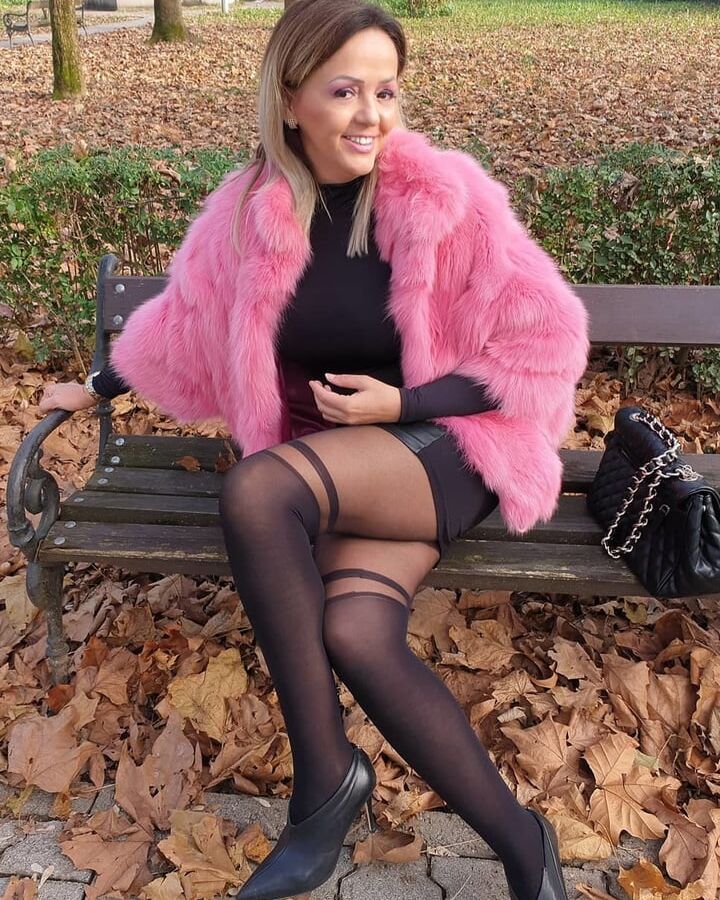 Amateur mature Sonja posing in nylon outside