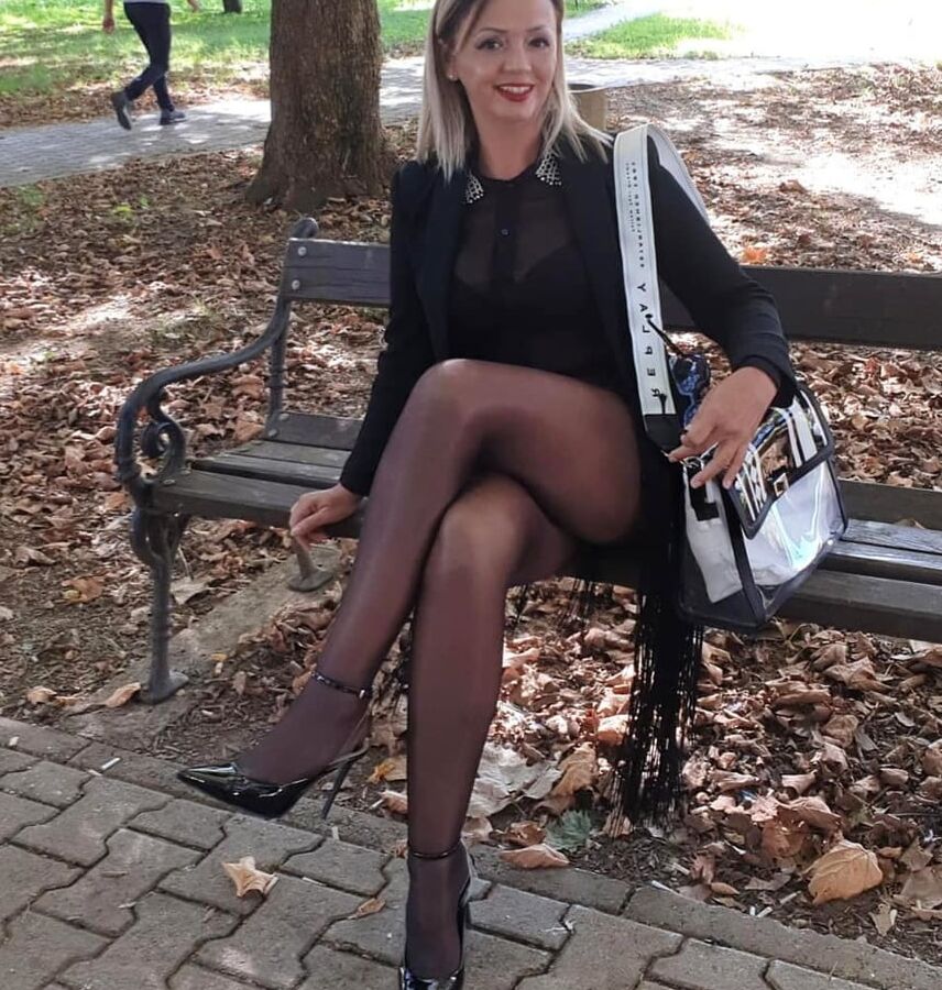 Amateur mature Sonja posing in nylon outside