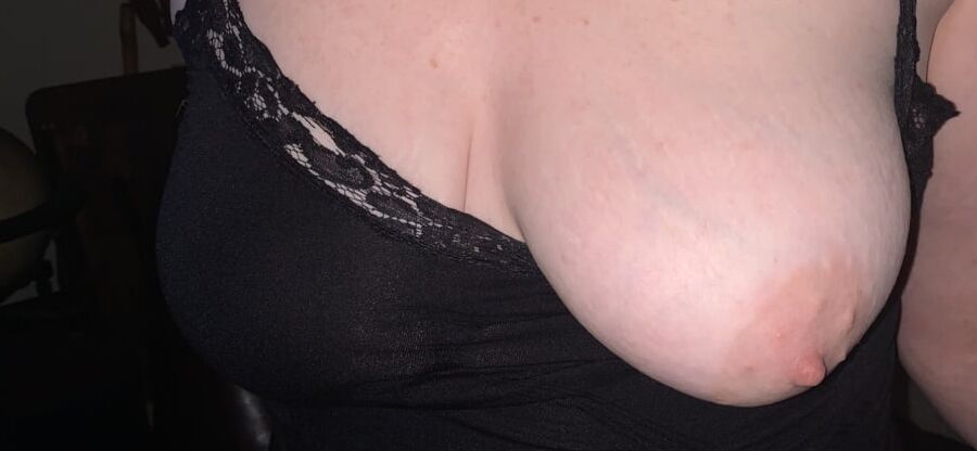 Her tits in and out of black lace tank top.