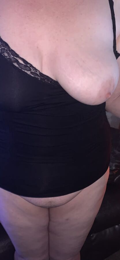 Her tits in and out of black lace tank top.
