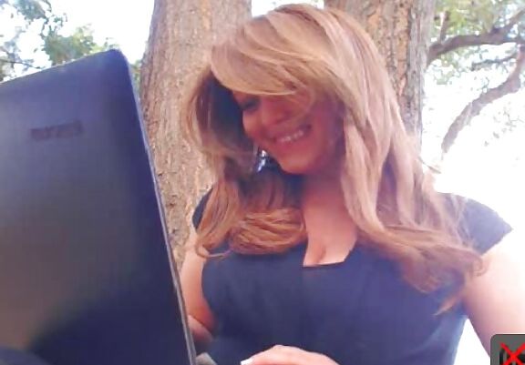 A mature girl flashes her boobs