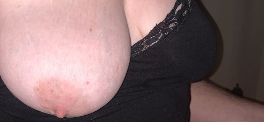 Her tits in and out of black lace tank top.