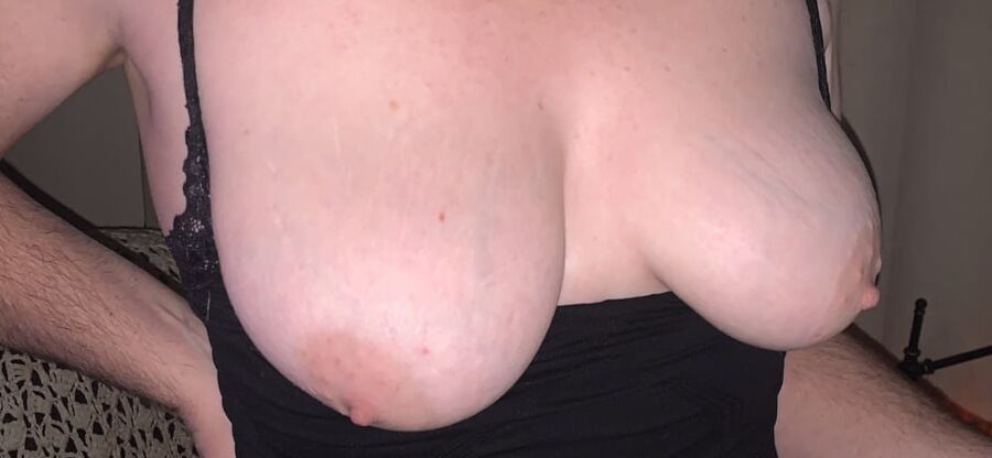 Her tits in and out of black lace tank top.