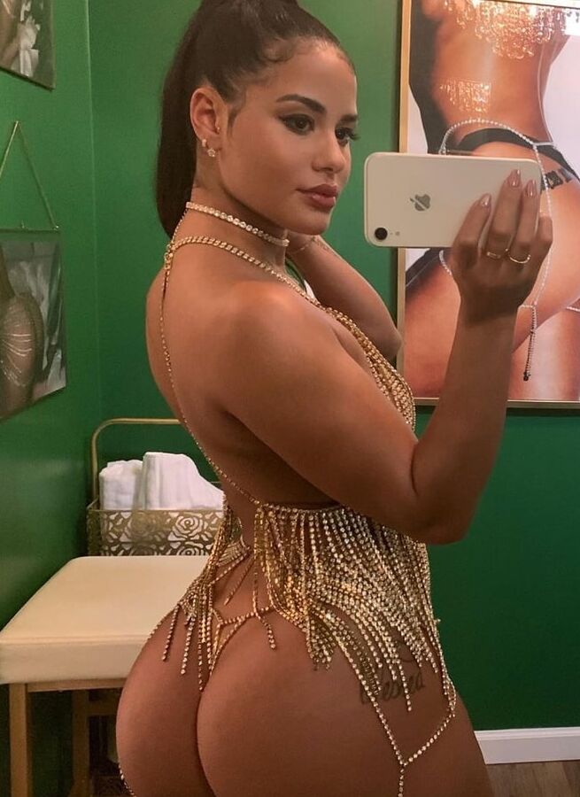 KATYA ELISE HENRY