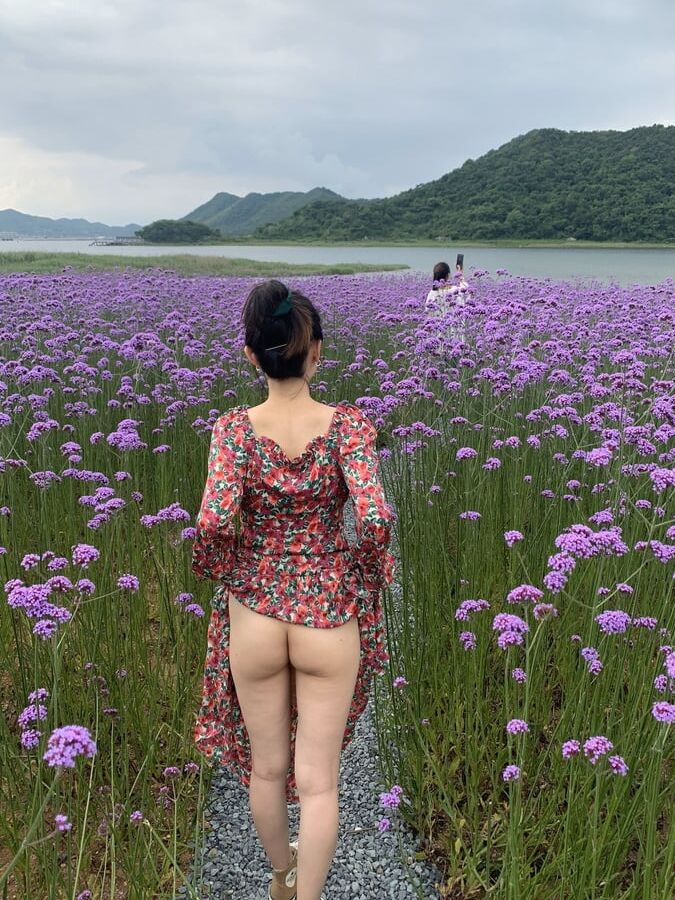 Chinese air hostess gives blowjob