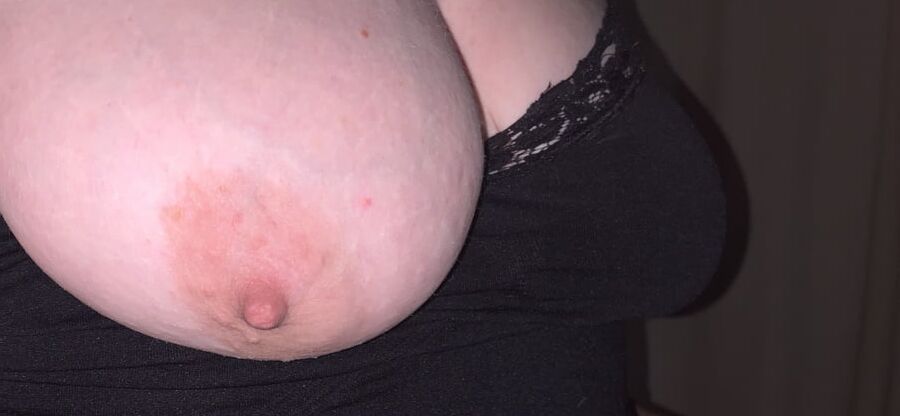 Her tits in and out of black lace tank top.