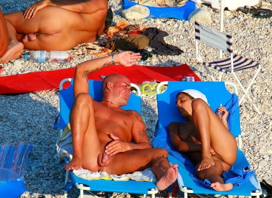 Naked couples on the beach