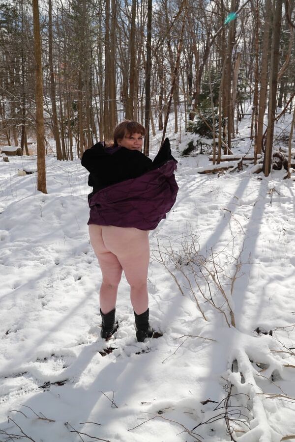 Sally in black cape in winter