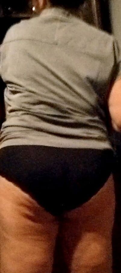 My mom walking around in panties