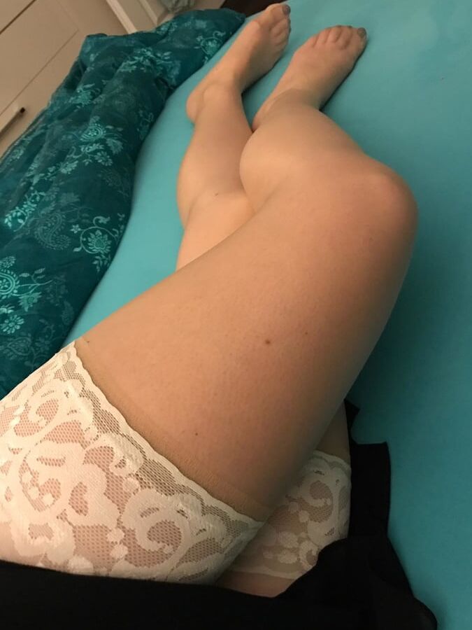 GF shows off stocking legs, feet and ass