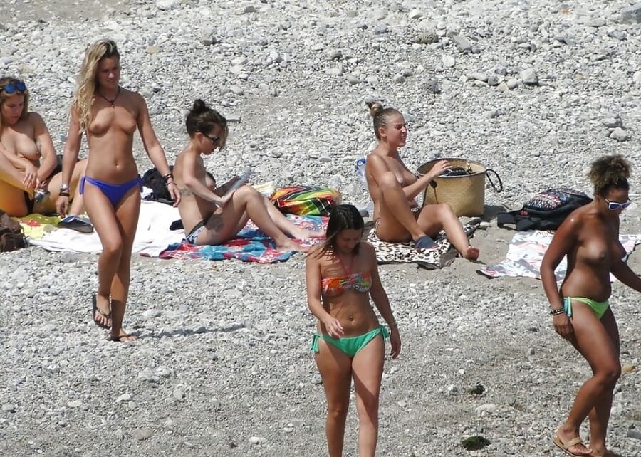 Girls Changing on the Beach for Topless Lovers