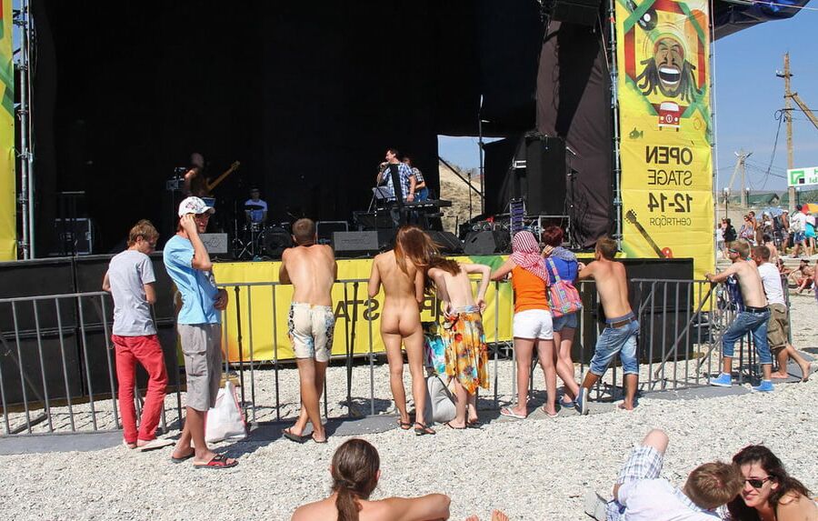 Two shameless girls undress at holidays beach