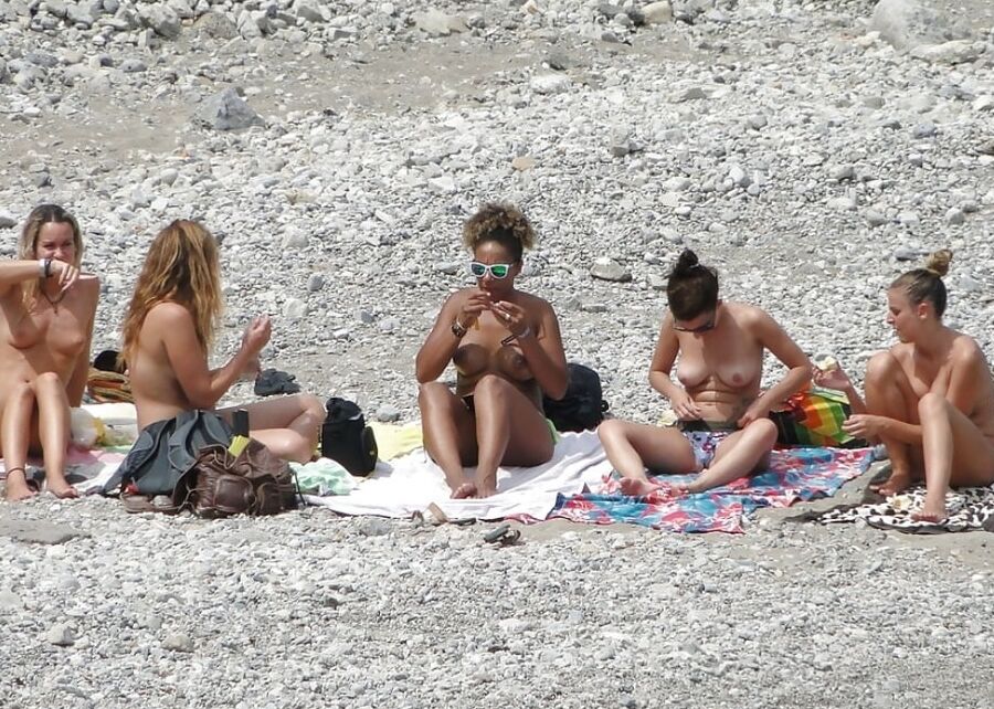 Girls Changing on the Beach for Topless Lovers