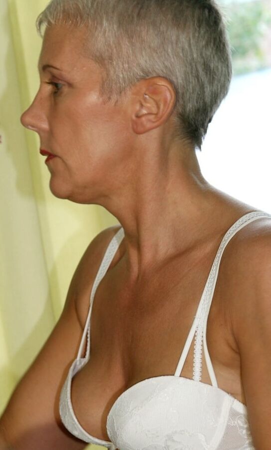 My pen-friend Rita strips from dress and white lingerie