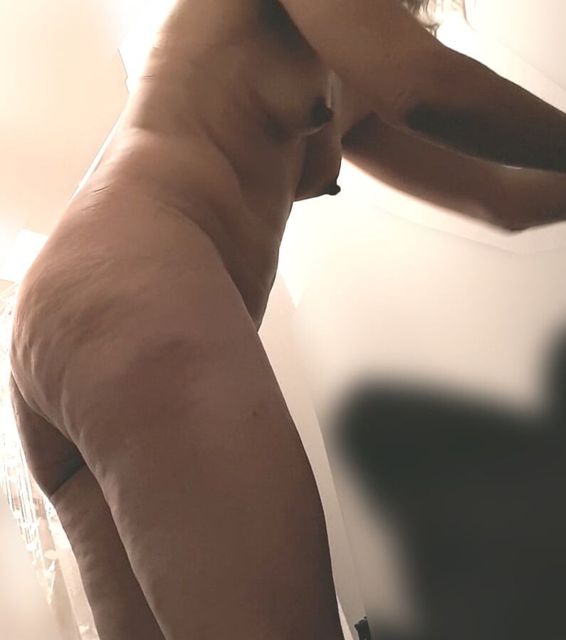 Hot mature lady getting naked