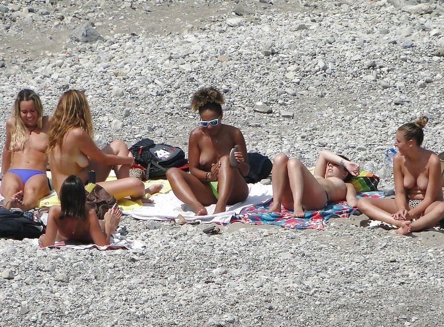 Girls Changing on the Beach for Topless Lovers