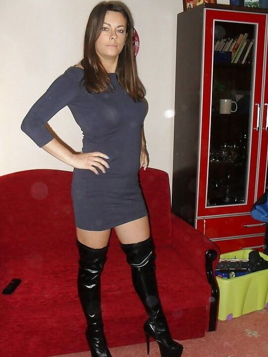 Trashy whores wearing stockings and high knee boots