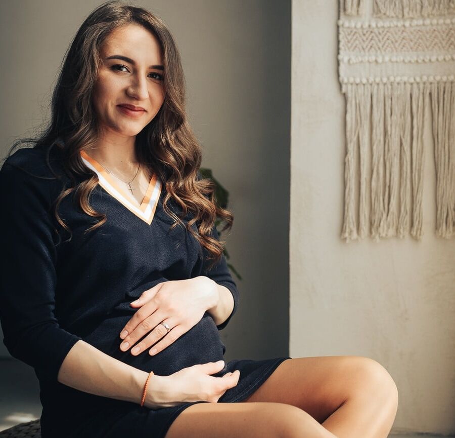 Pregnant Russian Bitch in Tan Pantyhose