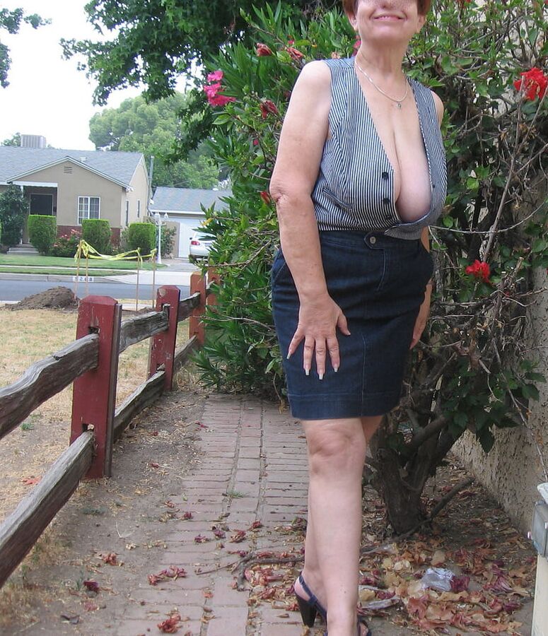 Brunette granny with big tits