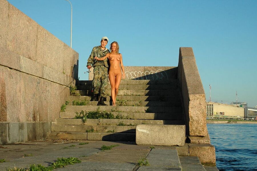 Nice sporty blonde posing naked at public with stranger