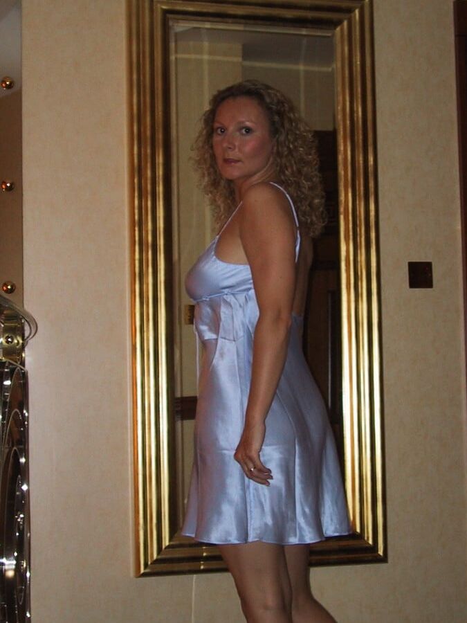 Curly milf show a bit